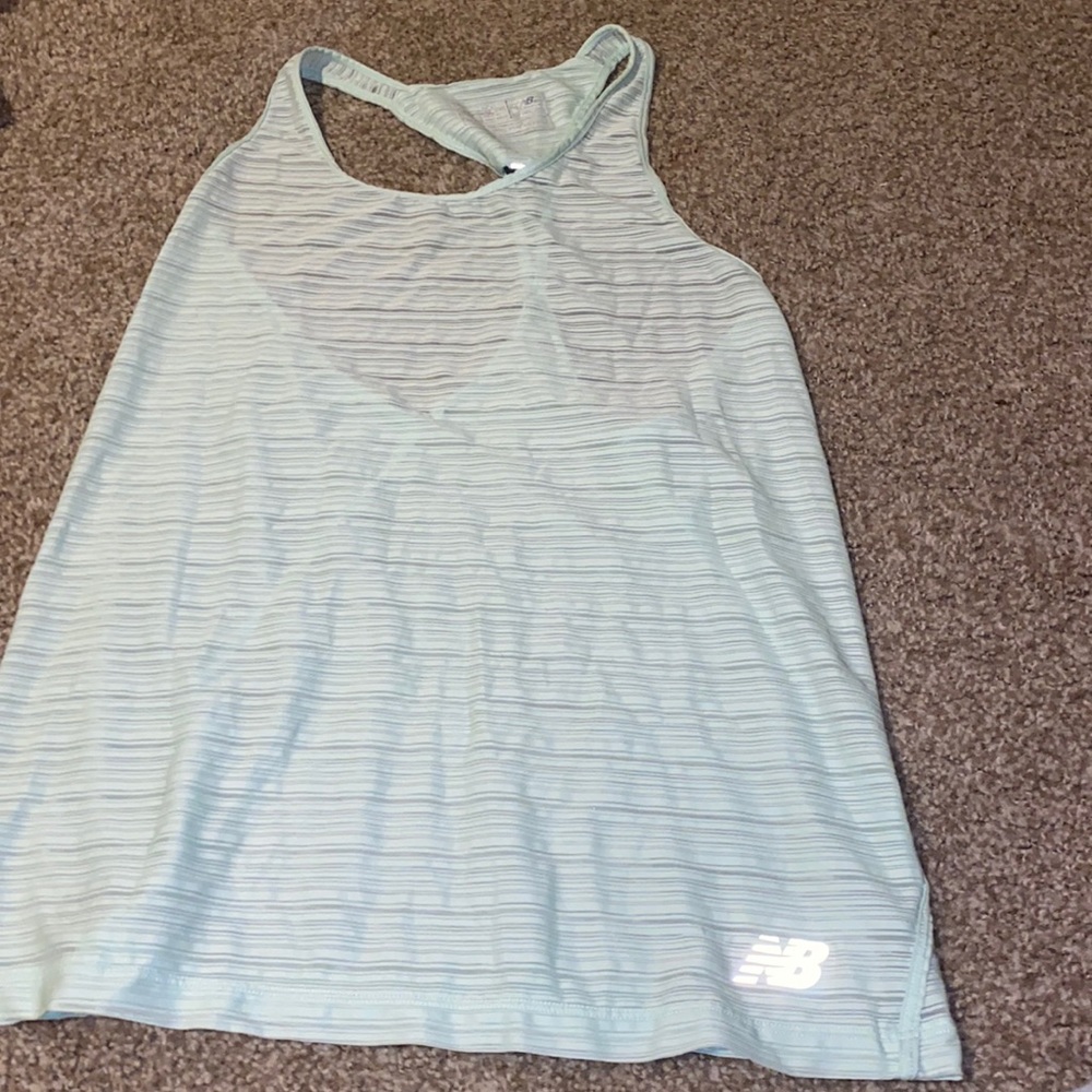 New Balance dry fit running tank. Size small worn once. Light green/blue